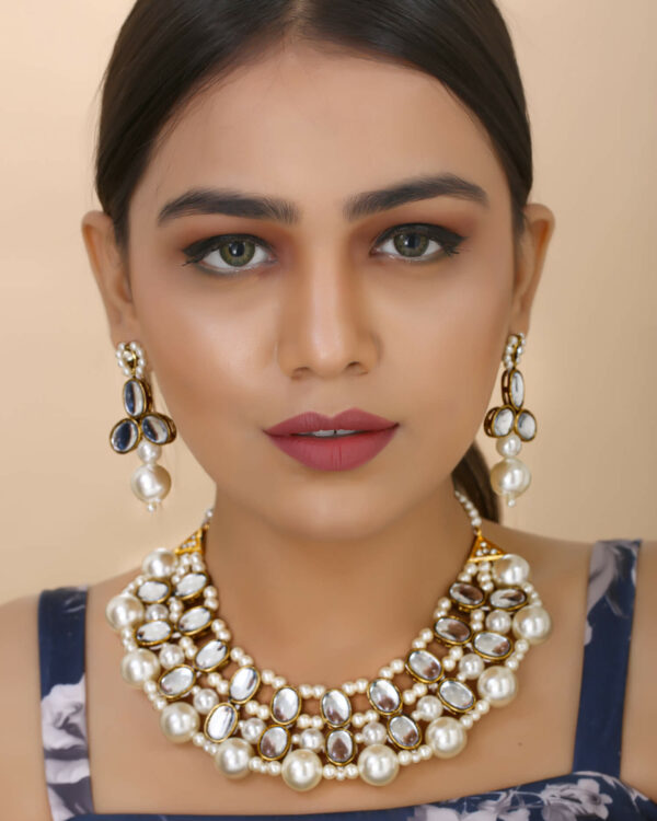 Beautiful Girl Wearing Off White Pearls Necklace Set